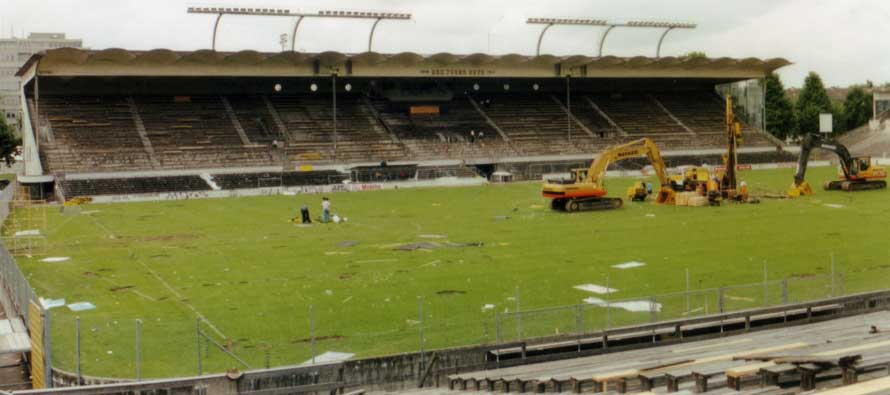 Diggers on the pitch of Wankdorf Stadium