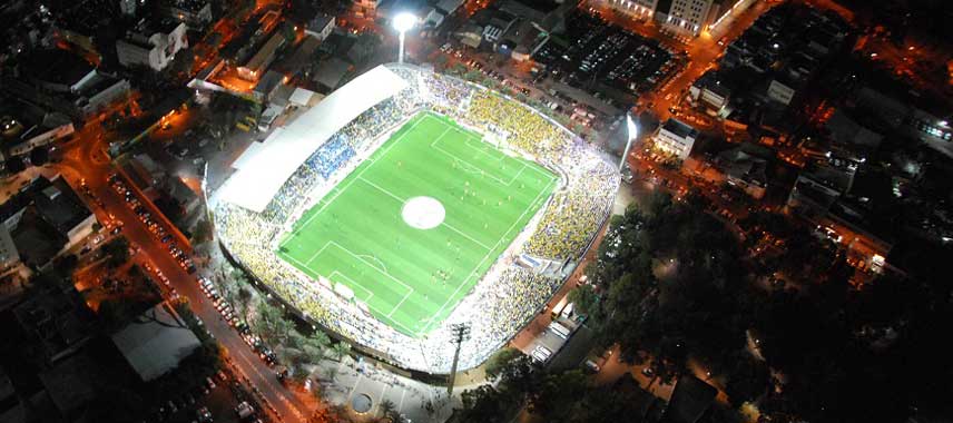 Night time view of Bloomfield stadium from the sky
